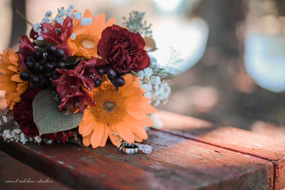 Wedding bands and bouquet