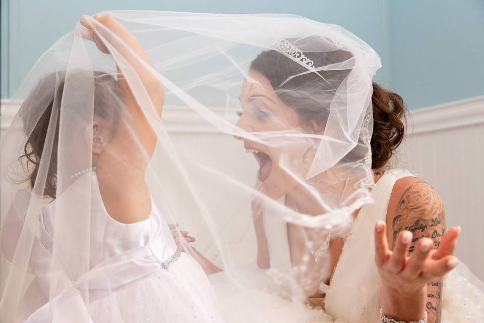 Mother and daughter under veil