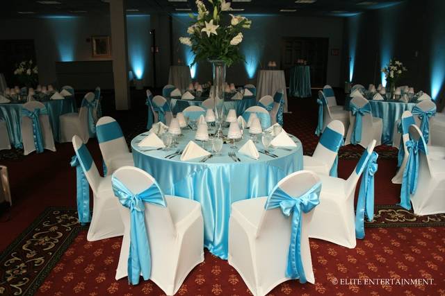 Wedding reception with table setup and centerpiece