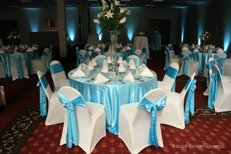 Wedding reception with table setup and centerpiece