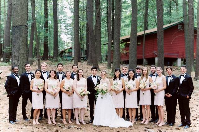 The couple with the bridesmaids and groomsmen