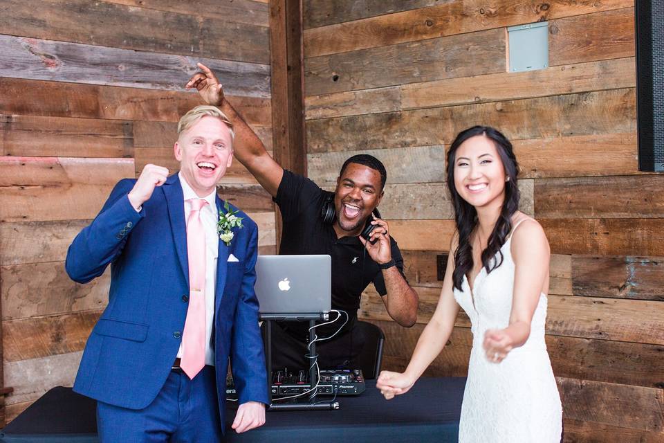 Newlyweds party with their DJ