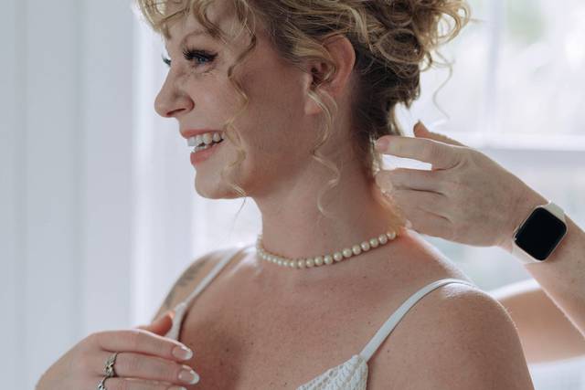 Romantic updo and sculpted gla