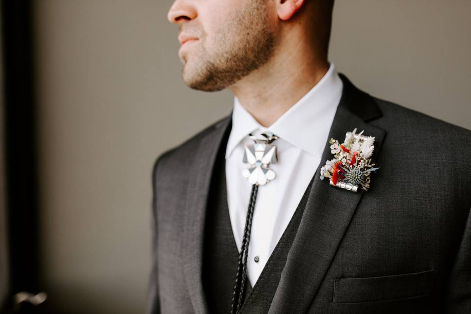 Groom bolo and boutonniere