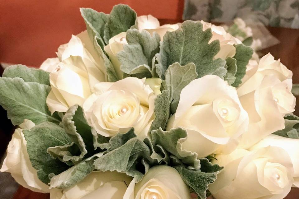 White roses and dusty miller