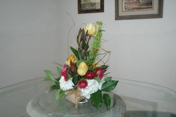 Potpourri of Silk Flowers and Cakes
