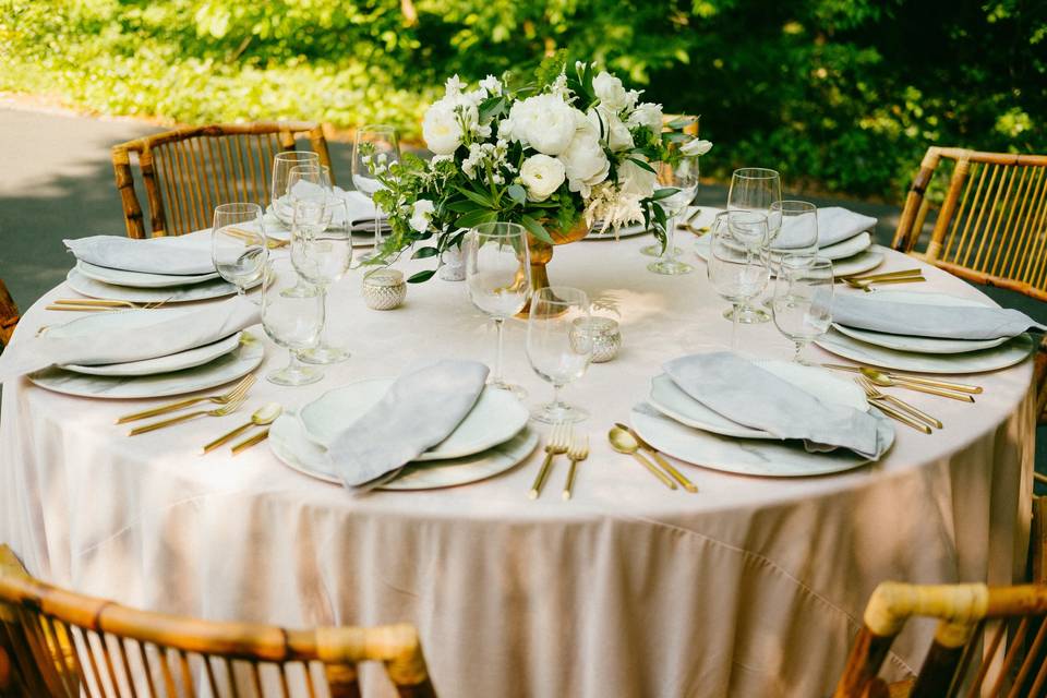 Table setting and floral centerpiece