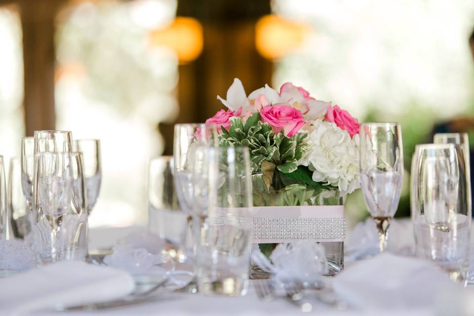 Floral table centerpiece and glassware