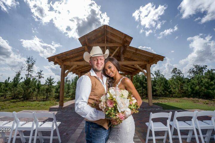 Couple at the ceremony site - Breaux Moments Photography