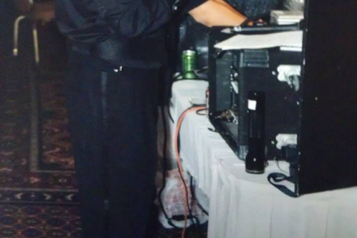 DJ Gary Rollins watching over the dance floor making sure people are enjoying themselves at The Hilton in Albuquerque, NM