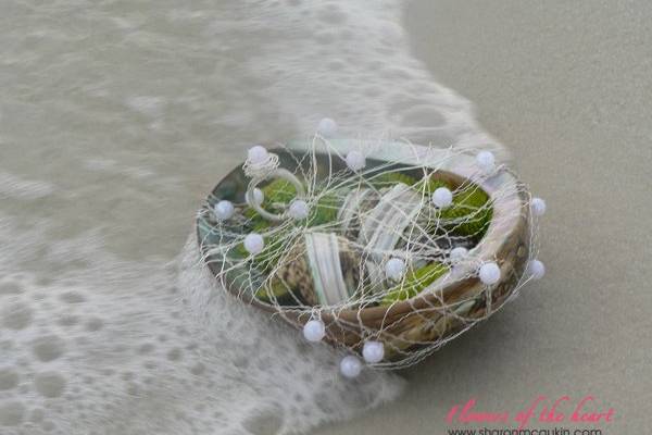 'Flowers of the heart' gives suggestions for planning a destination wedding including photos of floral designs like this one for the ring bearer as inspiration.