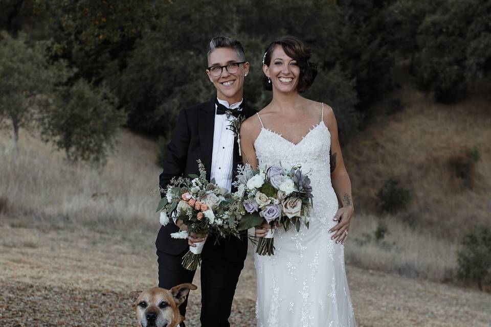 Couple posing with dog