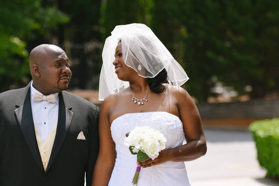 Newlyweds walking hand in hand