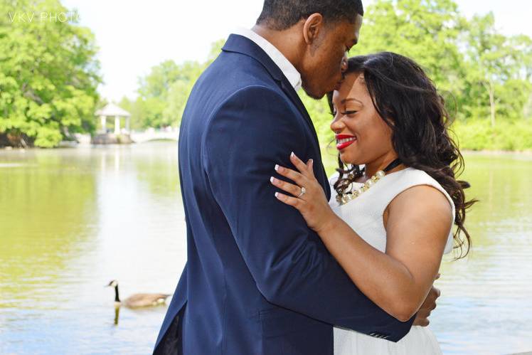 Kissing by a lake