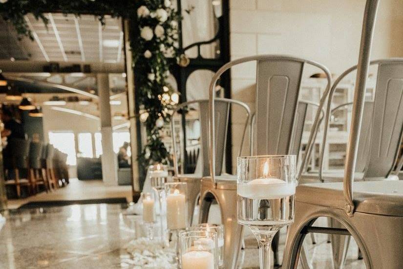 Wedding aisle candle and flowers decor