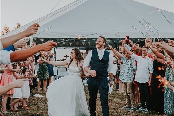 Couple celebrating arm in arm