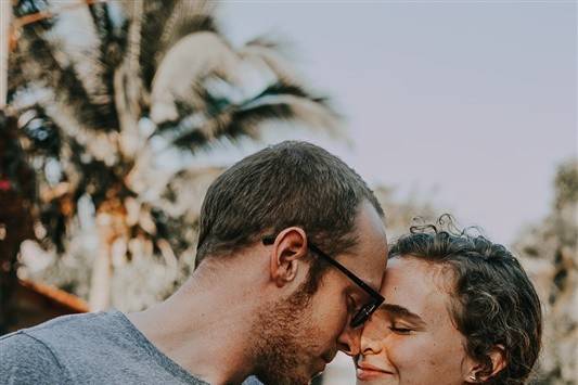 Couple touching foreheads