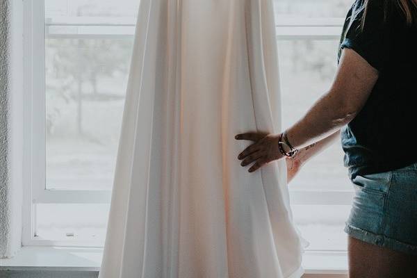 Wedding dress in front of window