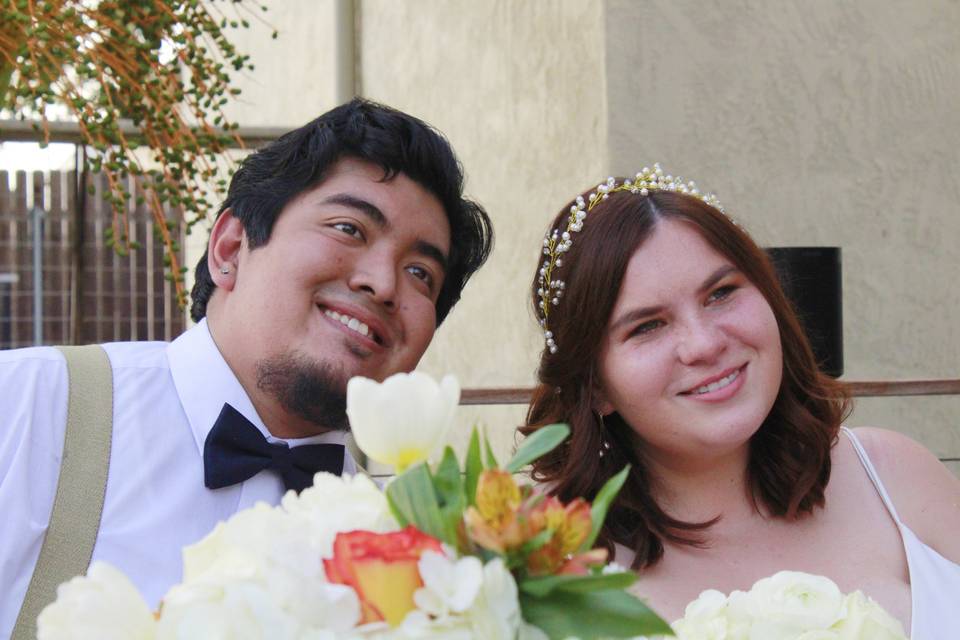 The couple posing for guests