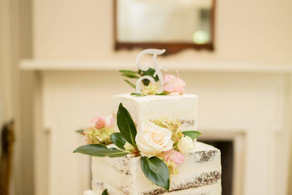 Naked cake decorated with fresh floral (photo credit Expressions by Erica)