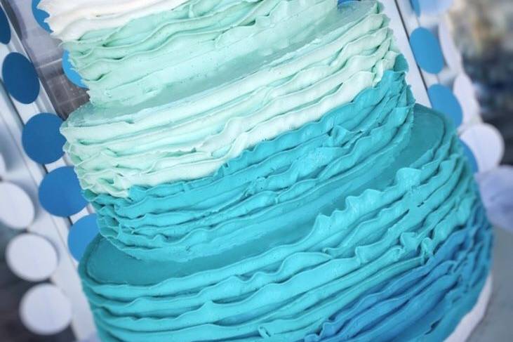 A wedding by the ocean needs a cake to match. Here we used our Italian Meringue buttercream to make gorgeous ruffles out of different ocean shades!