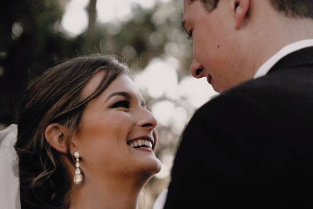 Bride laughing with groom