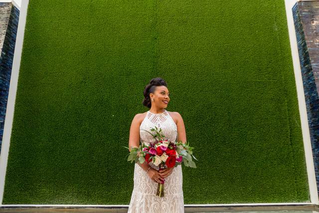 Bride and green wall backdrop