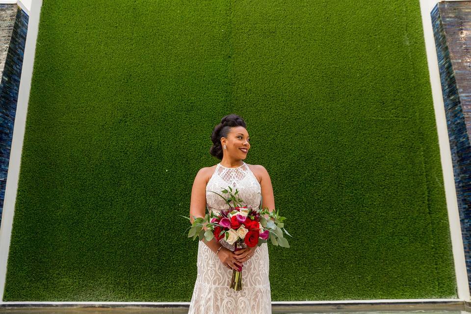 Bride and green wall backdrop