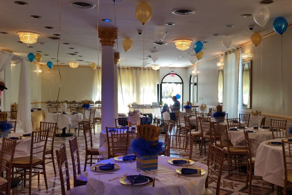 Baby shower for a boy at Arabella's Castle.Prince theme centerpieces.
