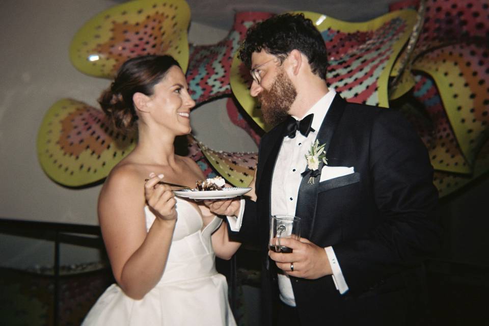 Happy couple eating cake