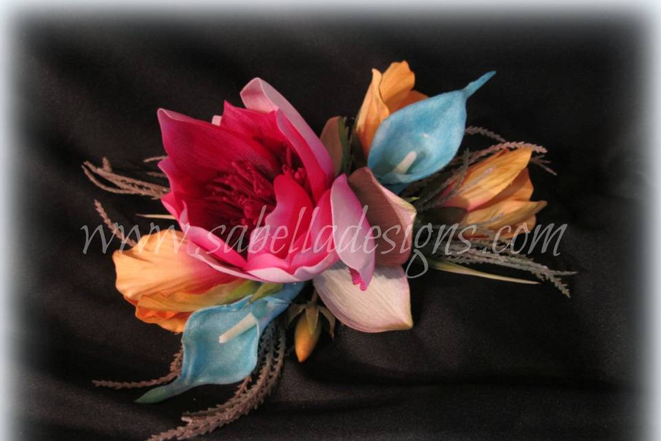 An amazing corsage full of tropical flowers with vibrant colors.