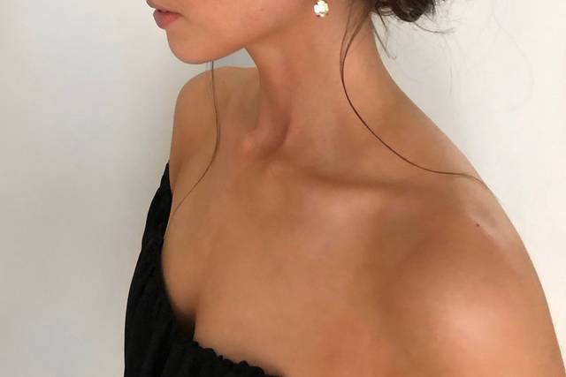 Low updo and makeup