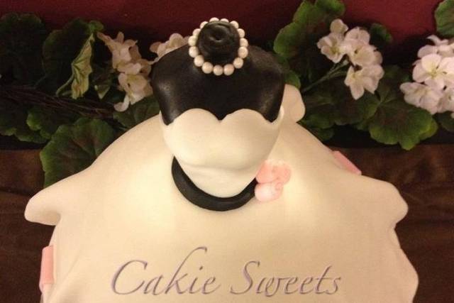 Wedding gown cake perfect for a bridal shower or as a wedding cake with cascading cupcakes. Color options available.