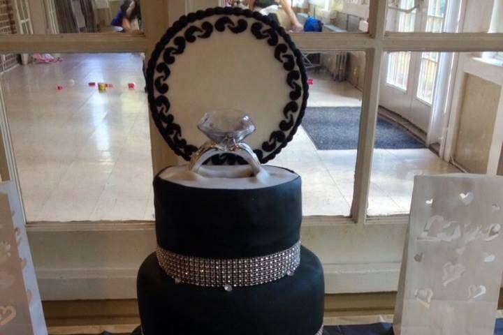 Unique wedding ring cake. Ring and other accessories are not edible.