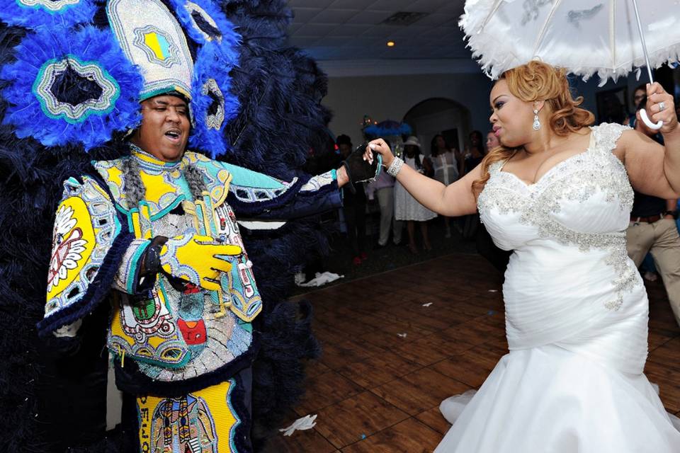 Couple dancing with their guests