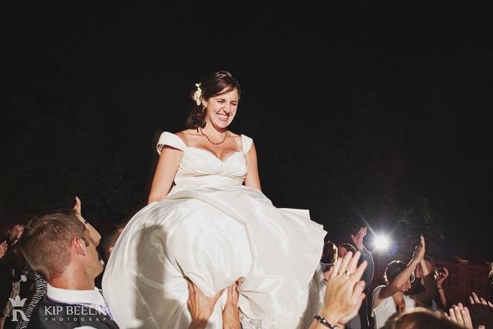 A bride on a chair in the air