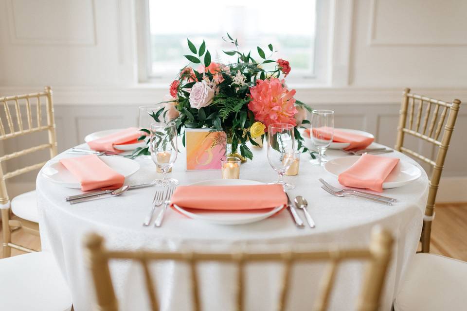 White and peach table setup