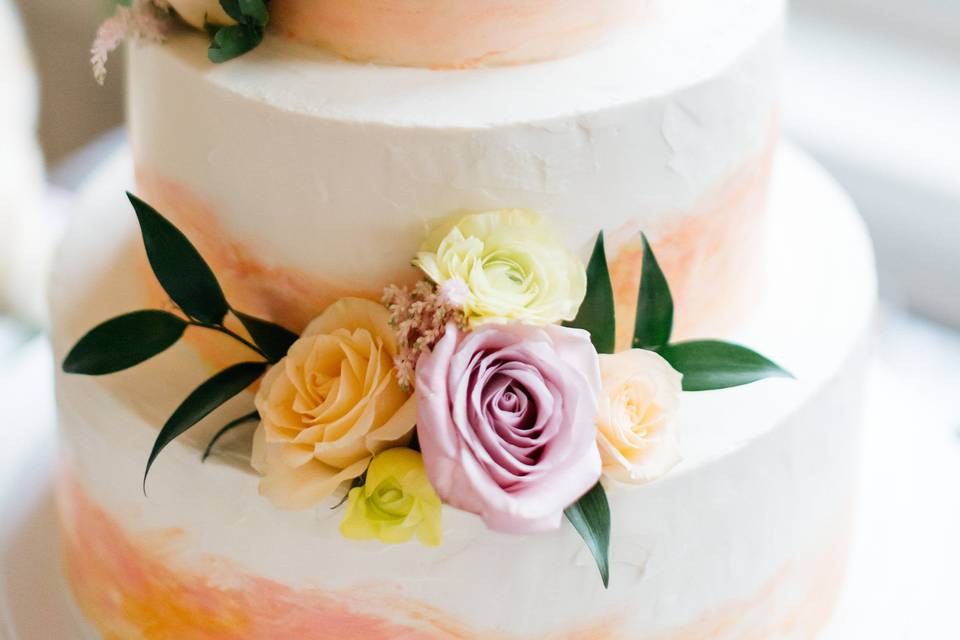 White wedding cake with flowers