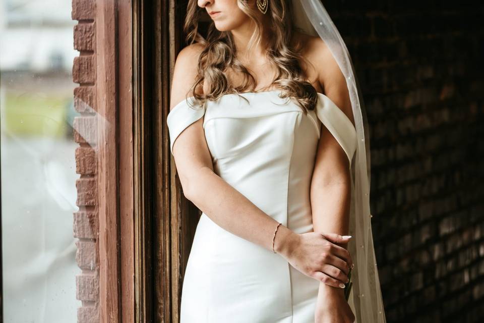 Bridal look out the window