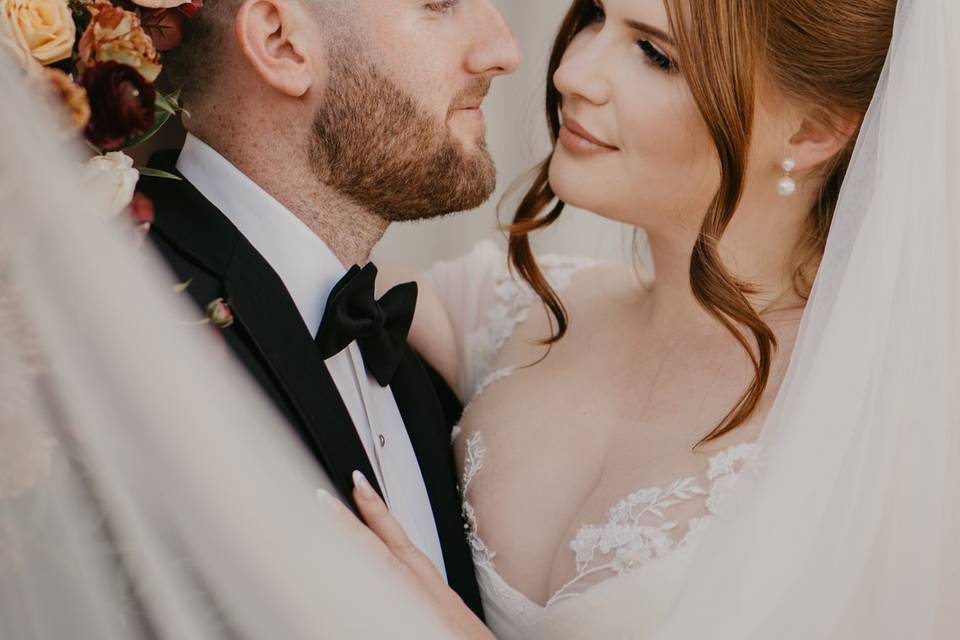 Bridal and groom eyes contact