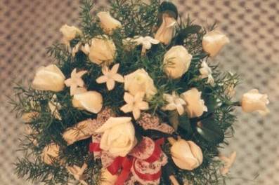 roses and stephanotis make this beautiful bouquet smell as sweet as it looks.