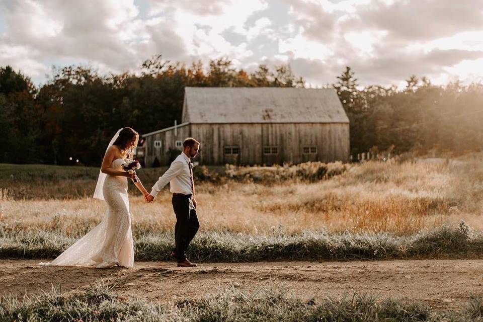 Newlyweds walking hand-in-hand