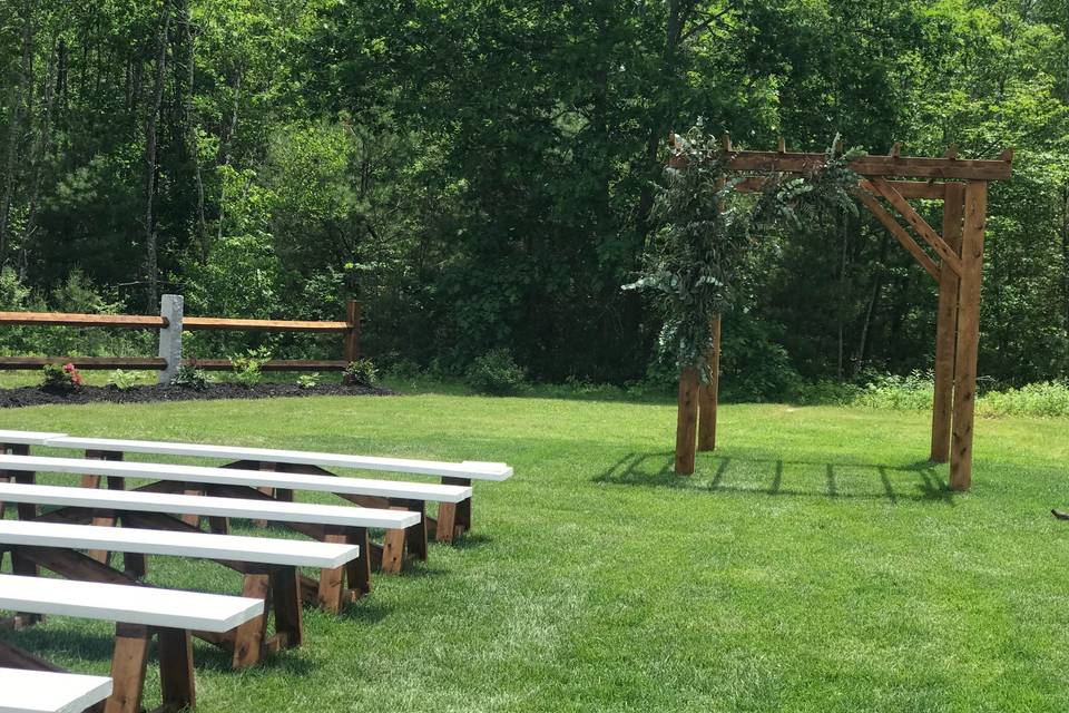 Benches and arbor for ceremony
