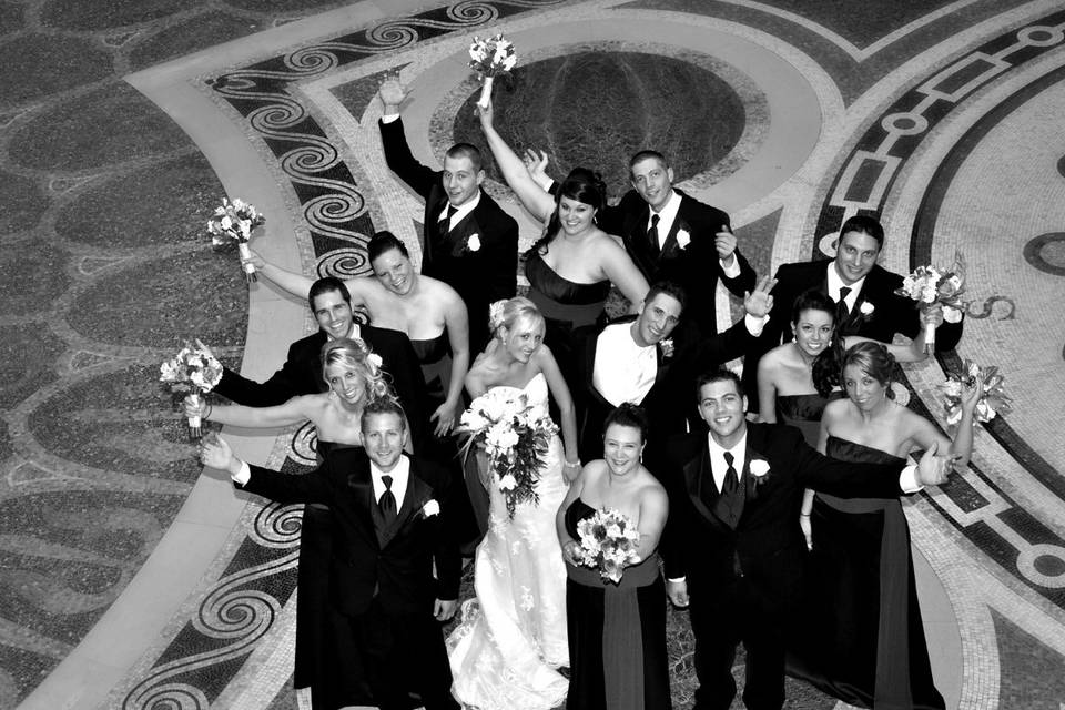 The couple with the bridesmaids and groomsmen