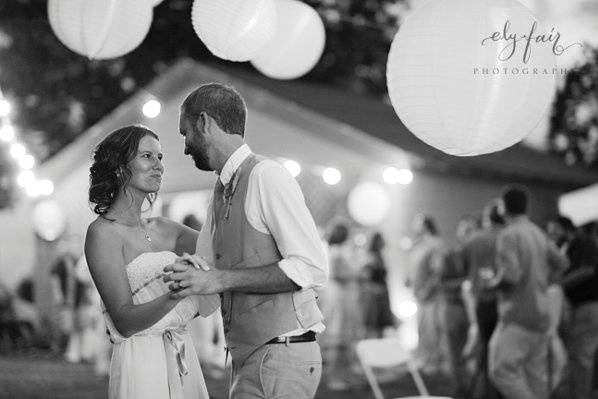 Bride and Groom first dance, outdoor wedding with globe lights