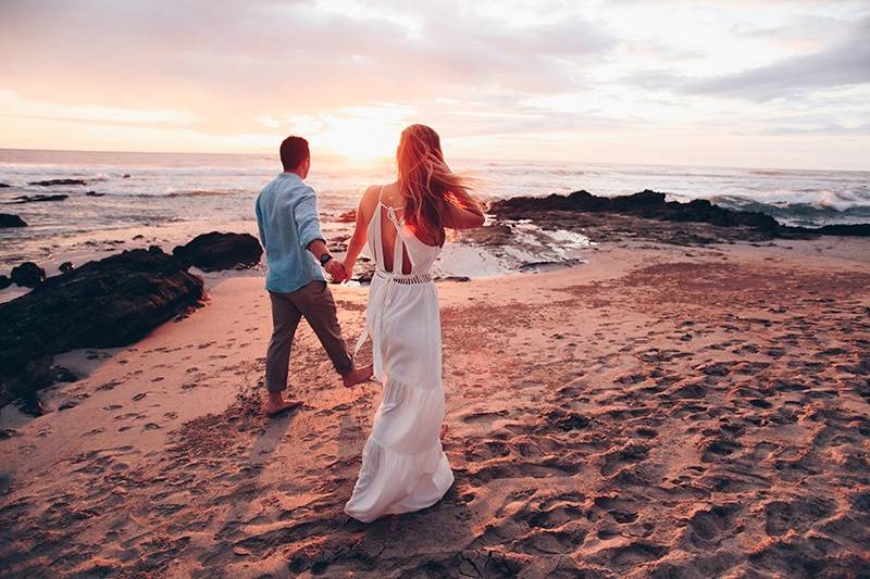 Bride and groom sunset stroll