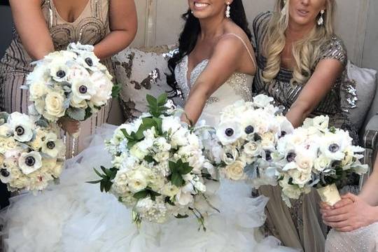 All smiles with matching bouquets