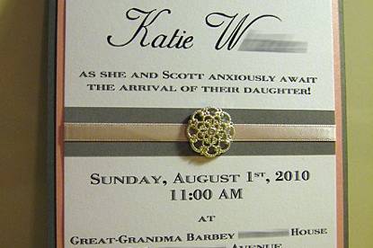 Custom baby shower invitation with ribbon detail and embellishment.