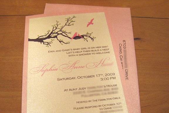 Sweet baby shower invitation with original nesting bird family graphic.