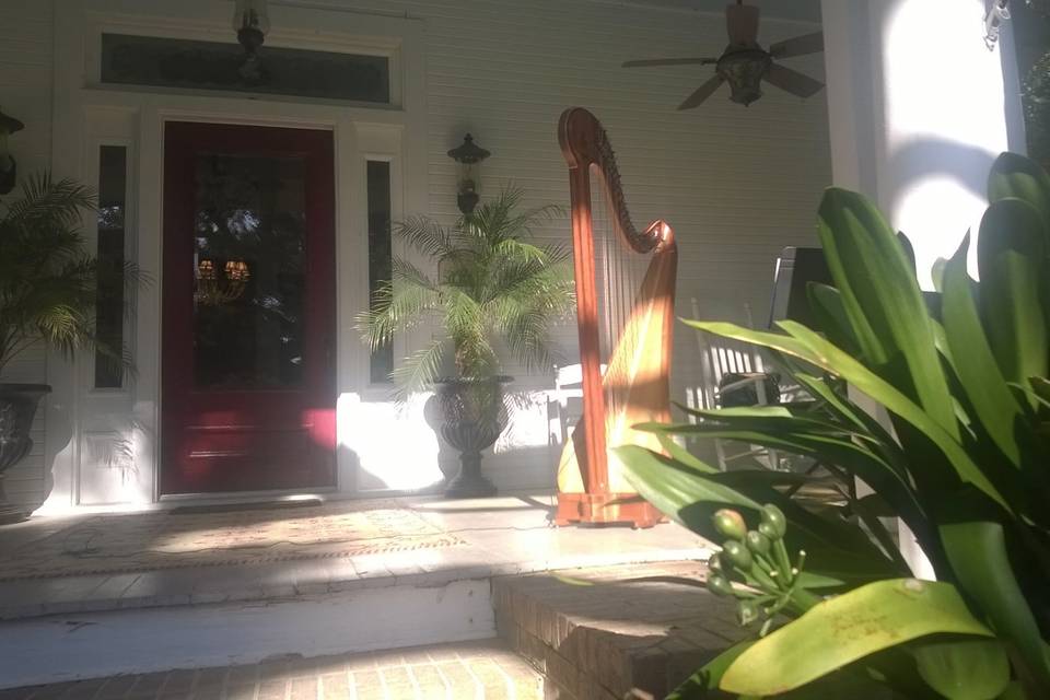 Playing for a ceremony under the grand oak at Caspiana Plantation House, on the porch.